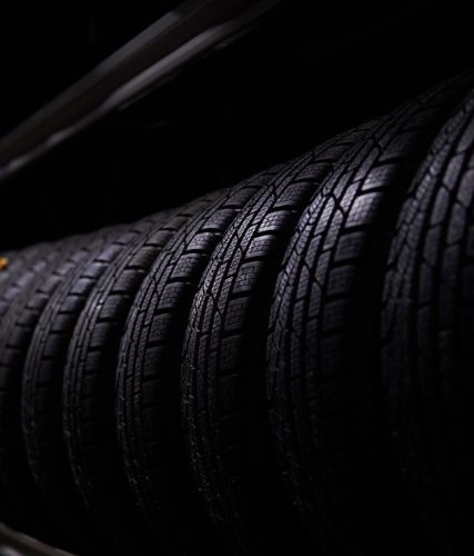 variety of tyres at busy warehouse
